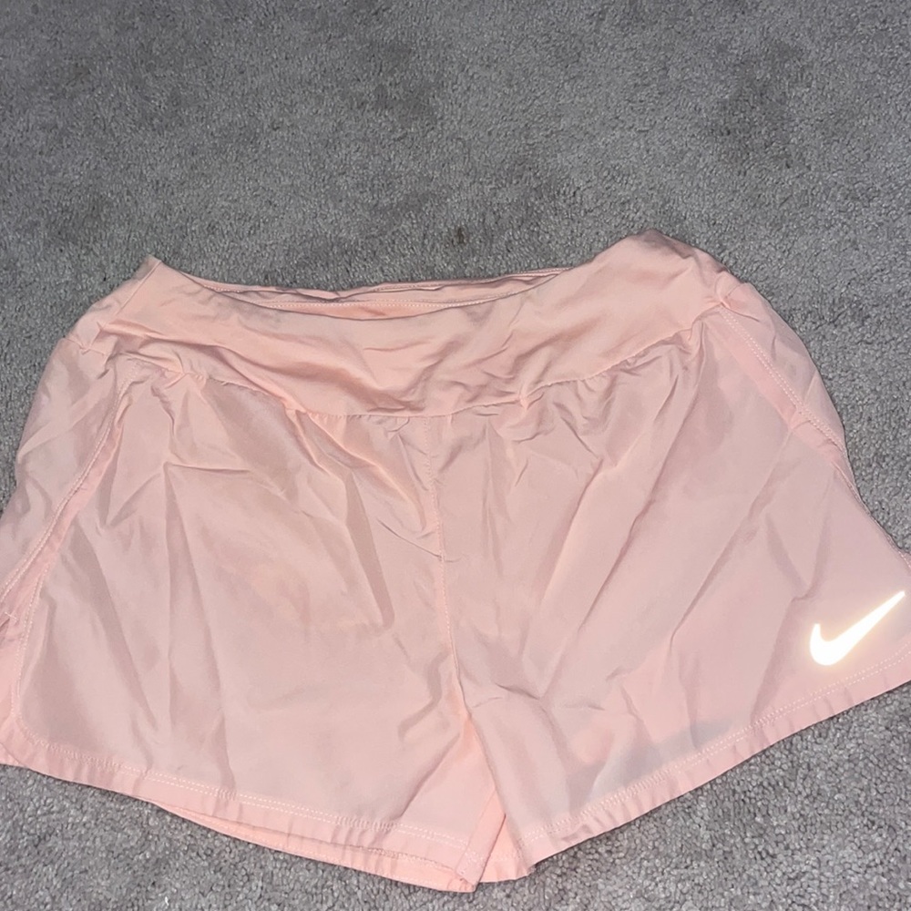 Pink Nike shorts
